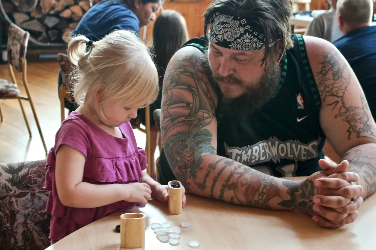 Camp Gratitude father and daughter playing together