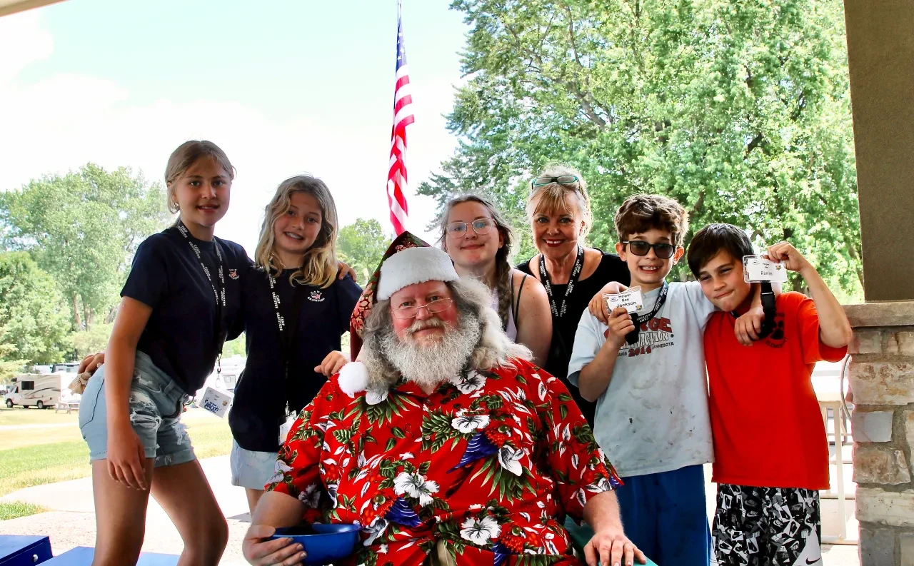 Camp Gratitude kids with Santa at camp